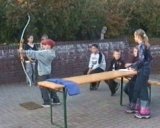 Bogenschie�en beim Kindergeburtstag